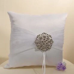 IVORY RING PILLOW W RHINESTONE BROOCH